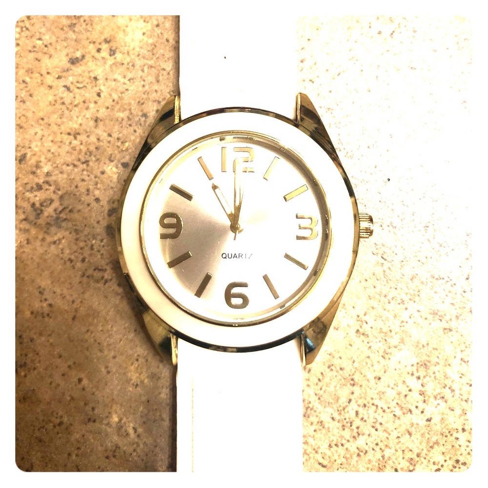 Very causal white and gold watch.